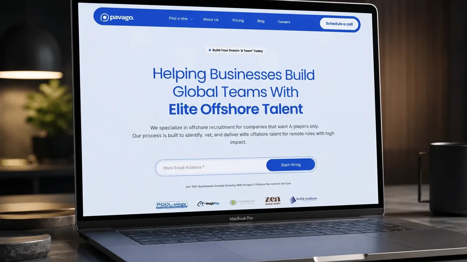 Responsive business website displayed on a laptop — website development in Kollam